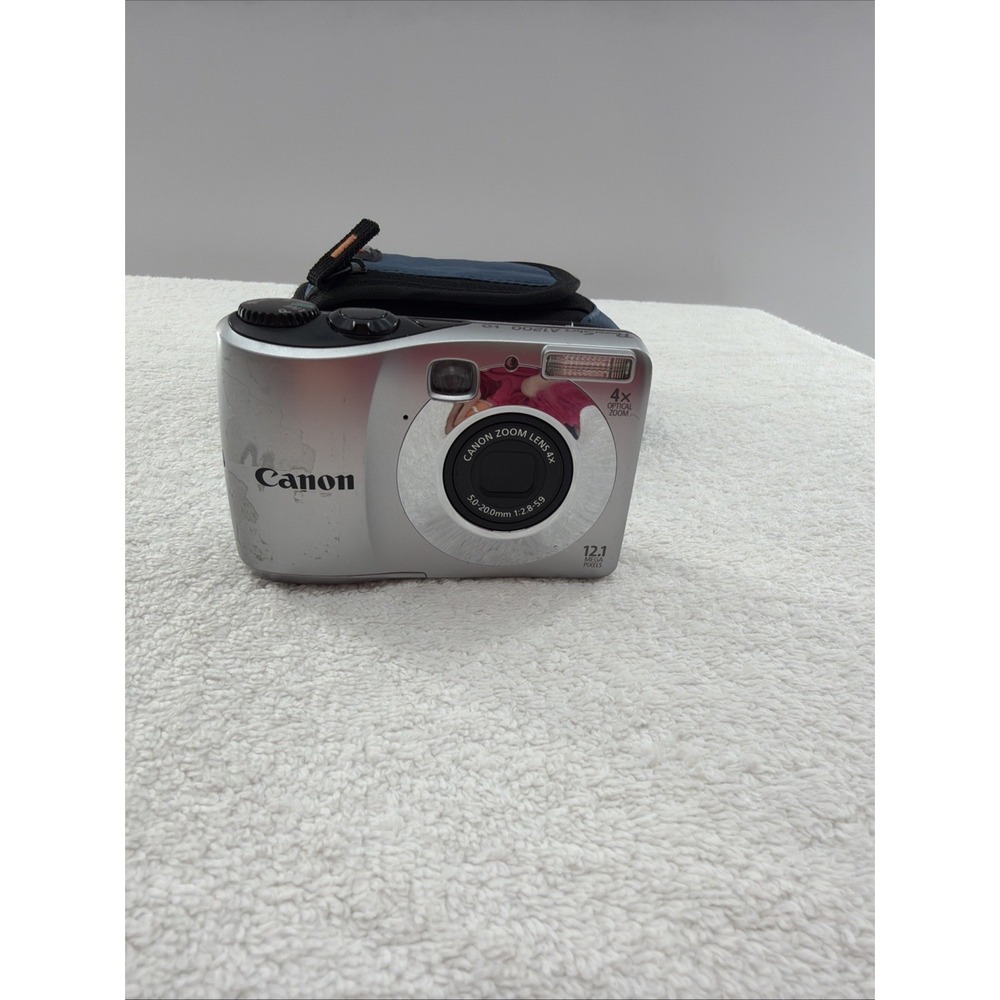Canon PowerShot A1200 12.1MP Digital Camera - Silver - (For Parts/Repair) & Case